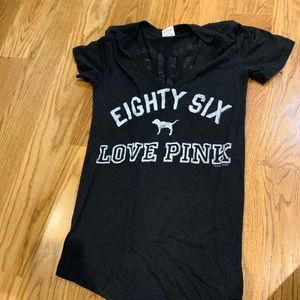 Black v neck vintage shirt with wording from PINK
